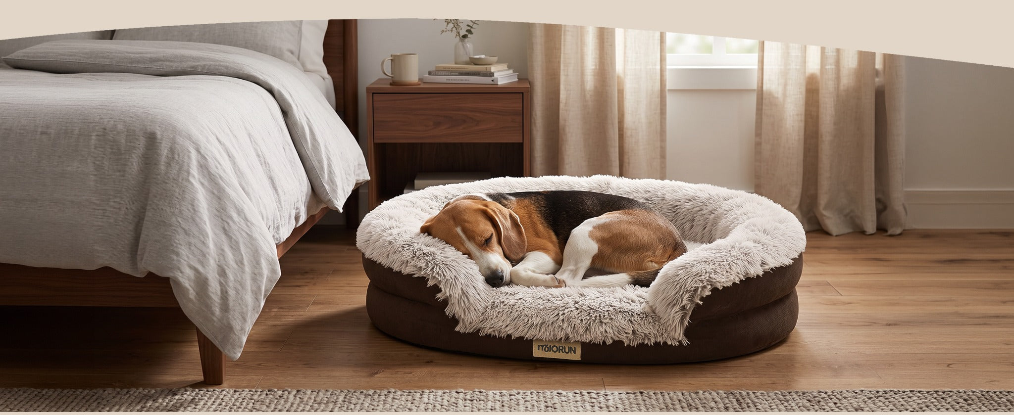 Dog bed beside a neutral bed